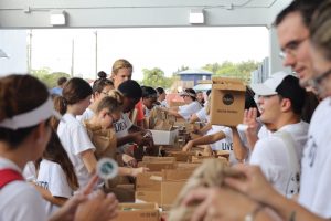 Indian River County Middle and Hish School students help to assemble over 3,000 weekend snack packs that will be distributed to local elementary school students.