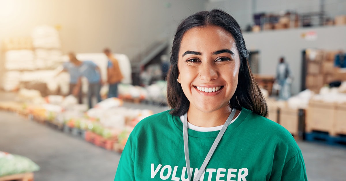 High school student volunteer smiling